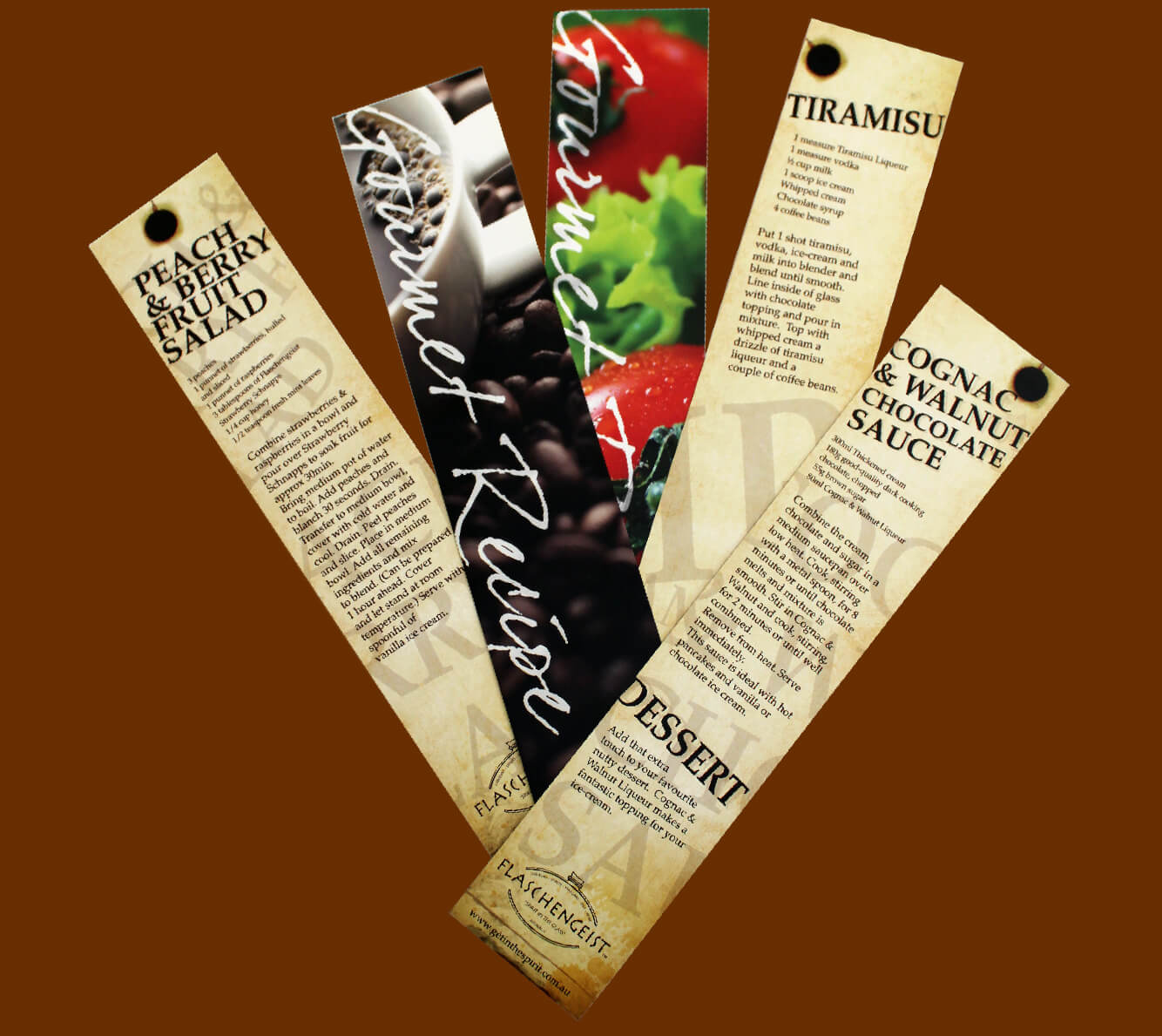 Colour photo of the range of Flaschengeist recipe bookmarks. Each shows various ingredients from the recipes on their backs